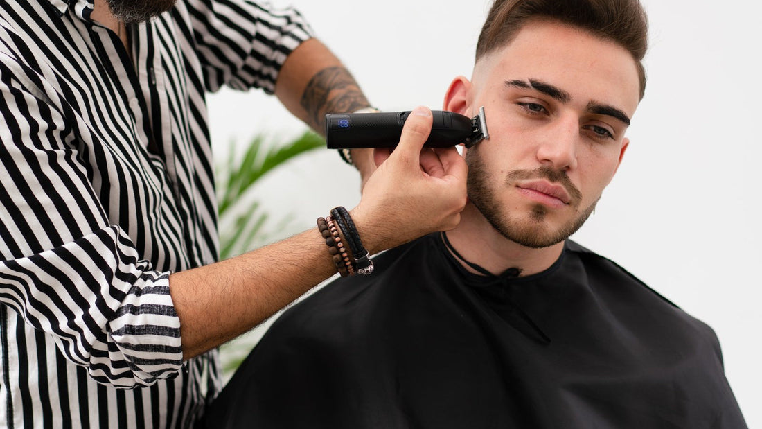 Trimmer cleaning the edge in front of the ear