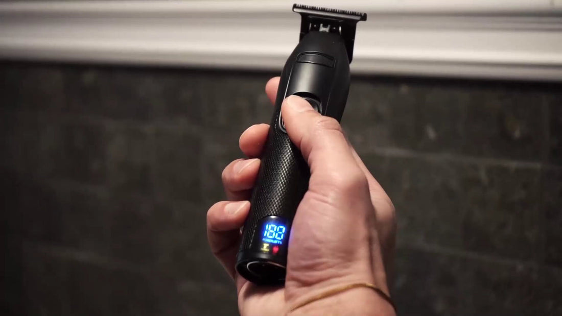 NOVAH trimmer held in hand with its battery display lit
